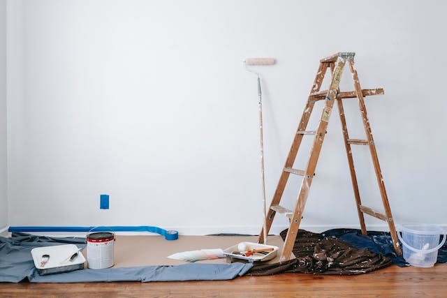 A wall in the middle of being painted.